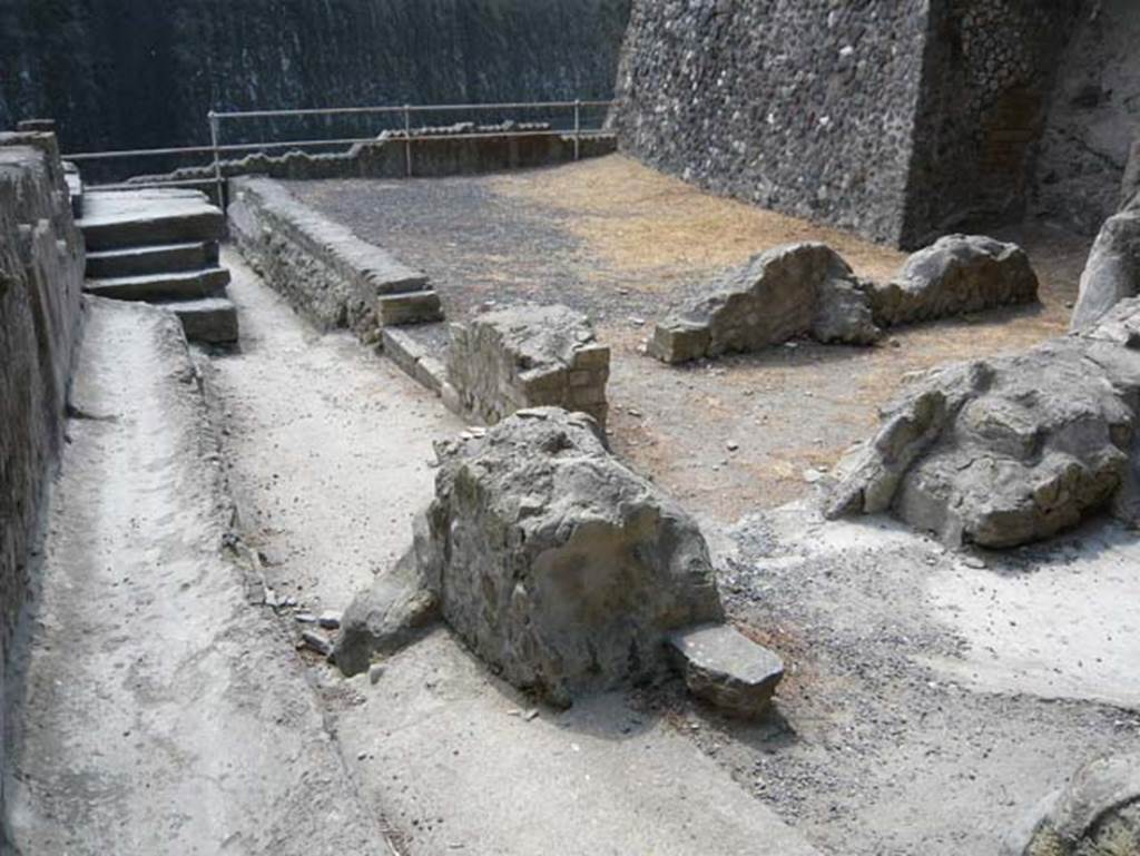 Herculaneum, August 2013. Sacred Area terrace, looking south in the north-west corner. Photo courtesy of Buzz Ferebee.